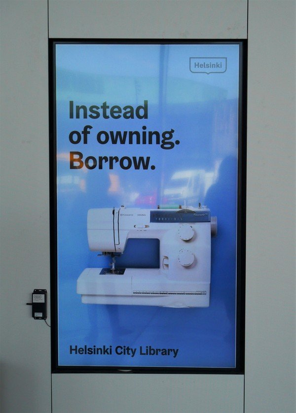Affiche publicitaire pour emprunter une machine à coudre