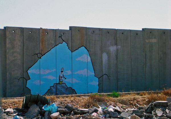 Graffiti sur le mur de séparation entre Israël et la Cisjordanie